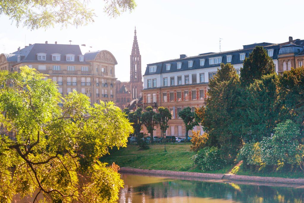 view of a river embankment and cathedral