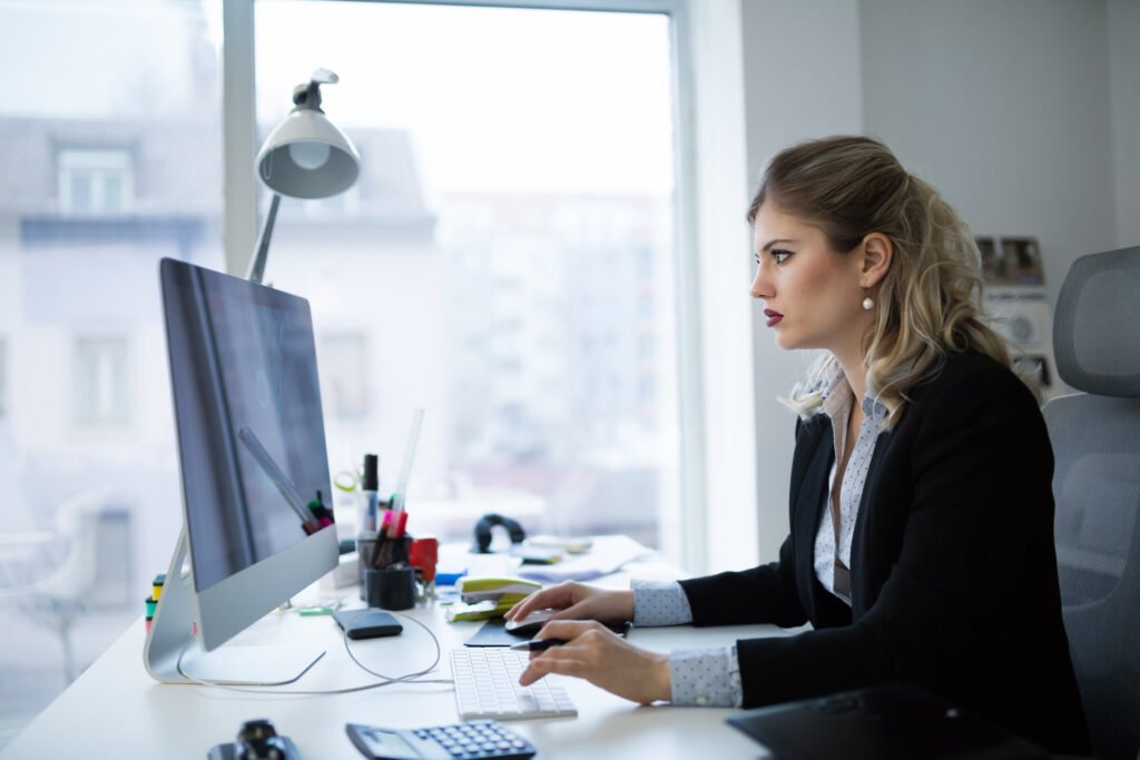 woman sat at desk