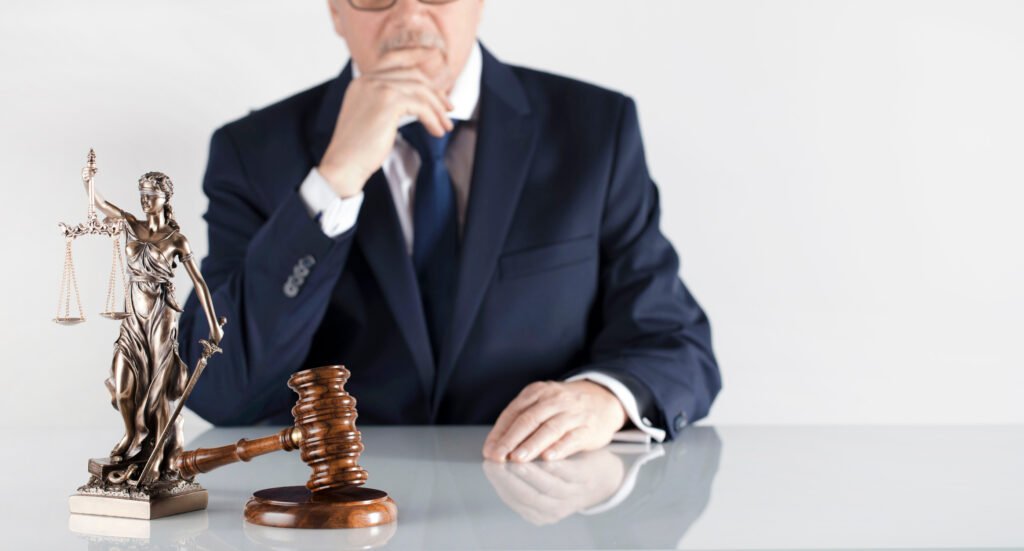 man sat on desk