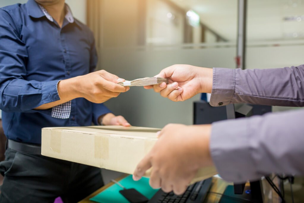 men passing cash