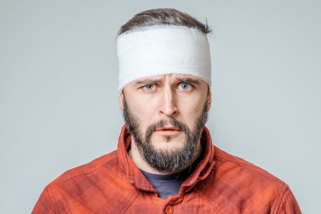 A man with a head injury wondering, do I need a solicitor for a personal injury claim?