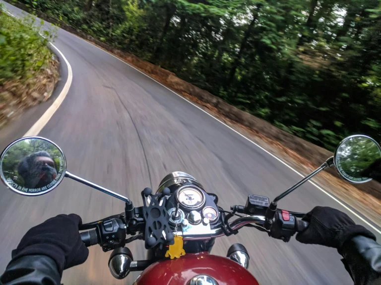 A motorcycle being ridden on a winding road.