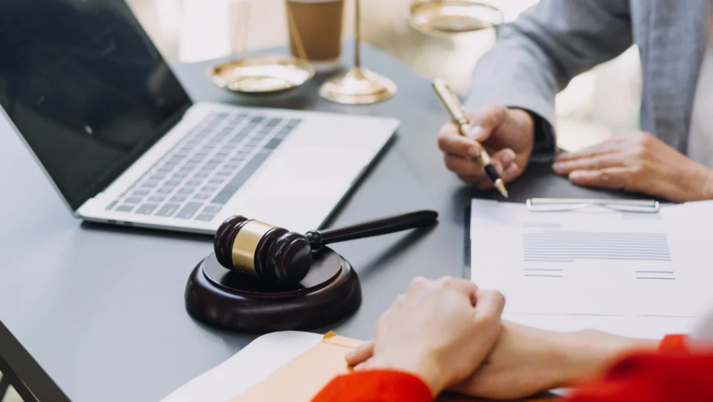 A personal injury solicitor writes down notes for a public transport accident claim